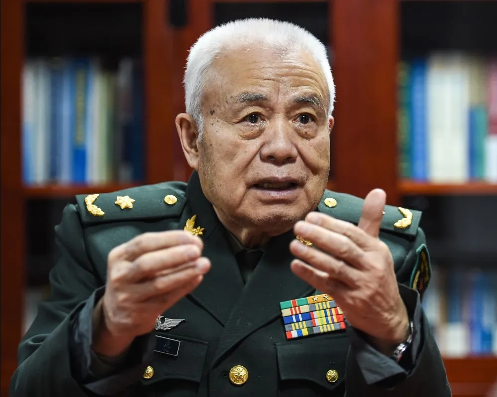 钱七虎人民日报撰文